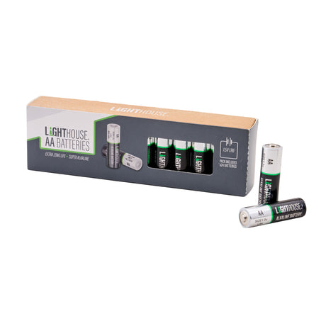 A box of Lighthouse AA batteries with four batteries displayed inside the window and two additional batteries standing upright in front, on a clean white background. Lighthouse AA Battery Pack | Pack of 24