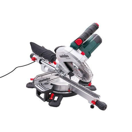 A Metabo miter saw with a silver aluminum base, black and gray components, a green and black motor housing, and red accent buttons, shown on a solid white background. Metabo Laser Cut Sliding Mitre Saw | 216mm