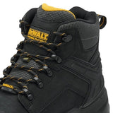 A close-up of a black DeWalt high-top work boot with yellow accents on the tongue lining, laces, and logo patches, set against a solid white background.