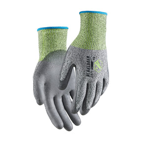 Pair of gray and green gloves on a white background