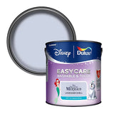 A can of Dulux EasyCare washable and tough paint, shown with its lid propped behind it. The label features Disney's 'The Little Mermaid' and 'Lavender Shell' branding, with illustrations of Ariel and a white dog.