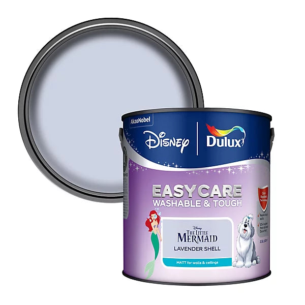 A can of Dulux EasyCare washable and tough paint, shown with its lid propped behind it. The label features Disney's 'The Little Mermaid' and 'Lavender Shell' branding, with illustrations of Ariel and a white dog.