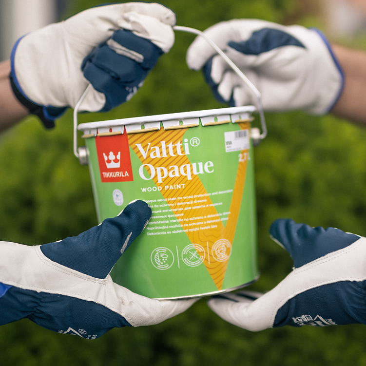 A bucket of Tikkurila Valti Opaque Wood Paint being held by gloved hands outdoors against a blurred green 
background.
Buy Tikkurila Valtti Opaque exterior wood paint online at Ted Johnsons. Durable semi-matt finish with excellent weather protection. Fast delivery Ireland.