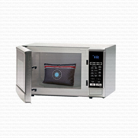 A stainless steel countertop microwave with its door open, showing a dark woven patterned pillow inside. The microwave has a digital control panel on the right side and is set against a white background with a faint repeating watermark pattern.