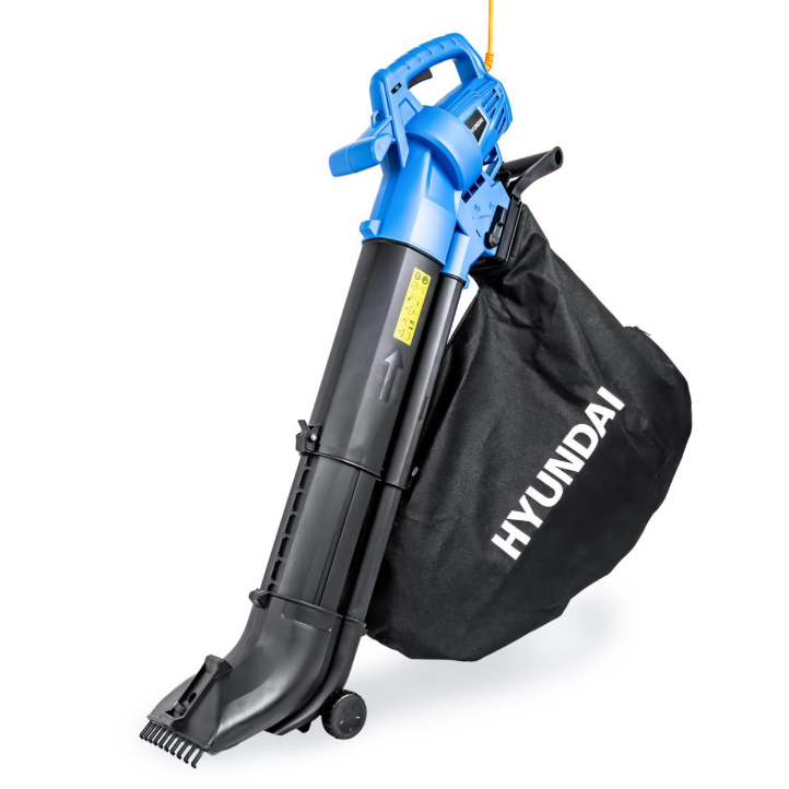 A Hyundai cordless leaf blower with a blue motor housing, black collection tube, and a black dust bag with white HYUNDAI branding, shown on a white background. 
Hyundai 3000w 3-in-1 Leaf Blower, Vacuum & Shredder | 45L Bag