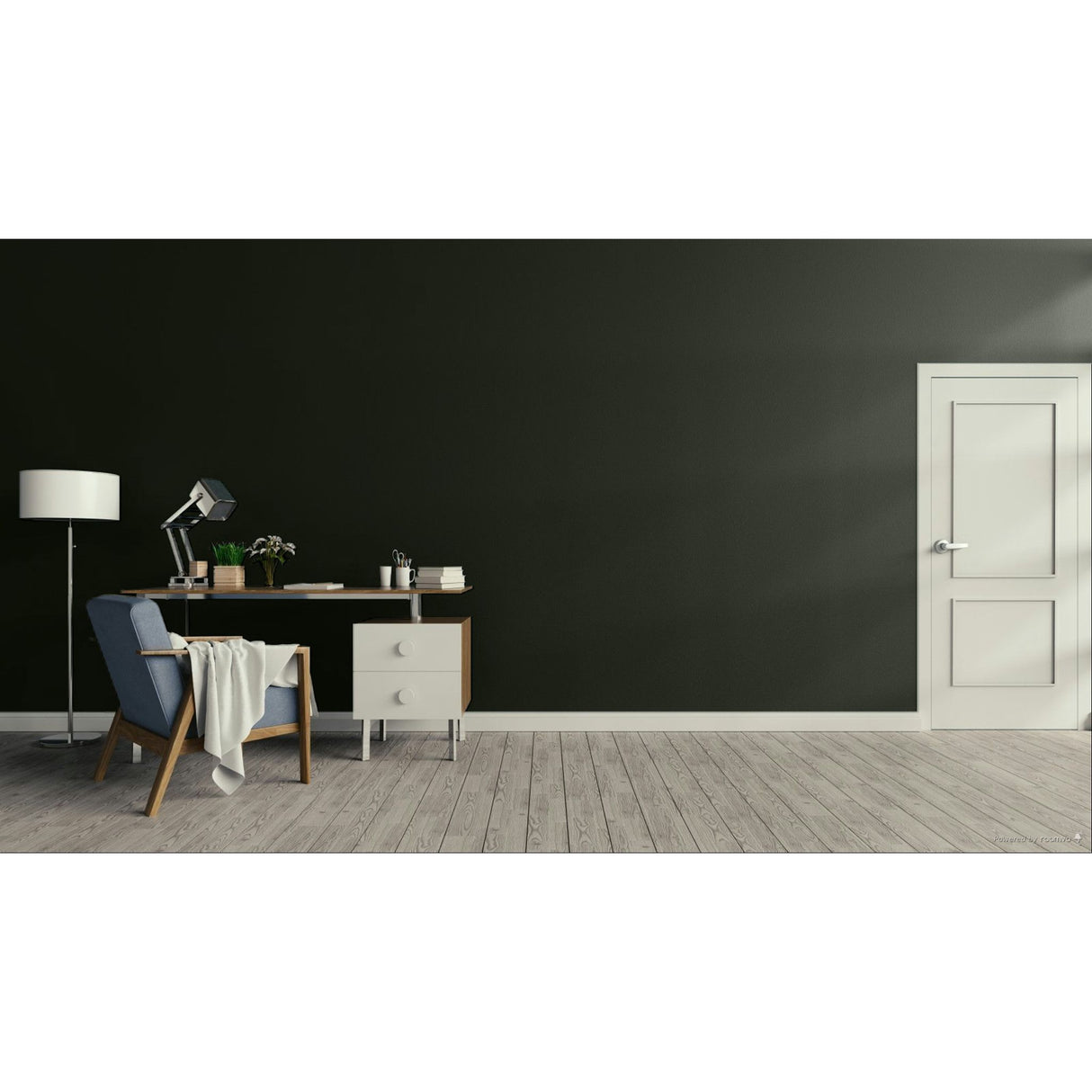 A modern interior room with a dark charcoal wall, light wood floor, a white door on the right, and a home office setup on the left featuring a blue armchair, desk, lamp, and small cabinet.